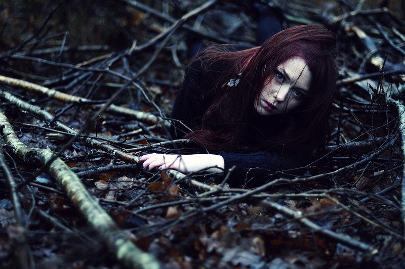 girl,buried,forest