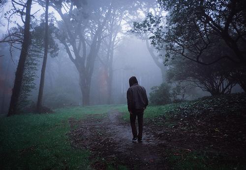 sad boy walking alone